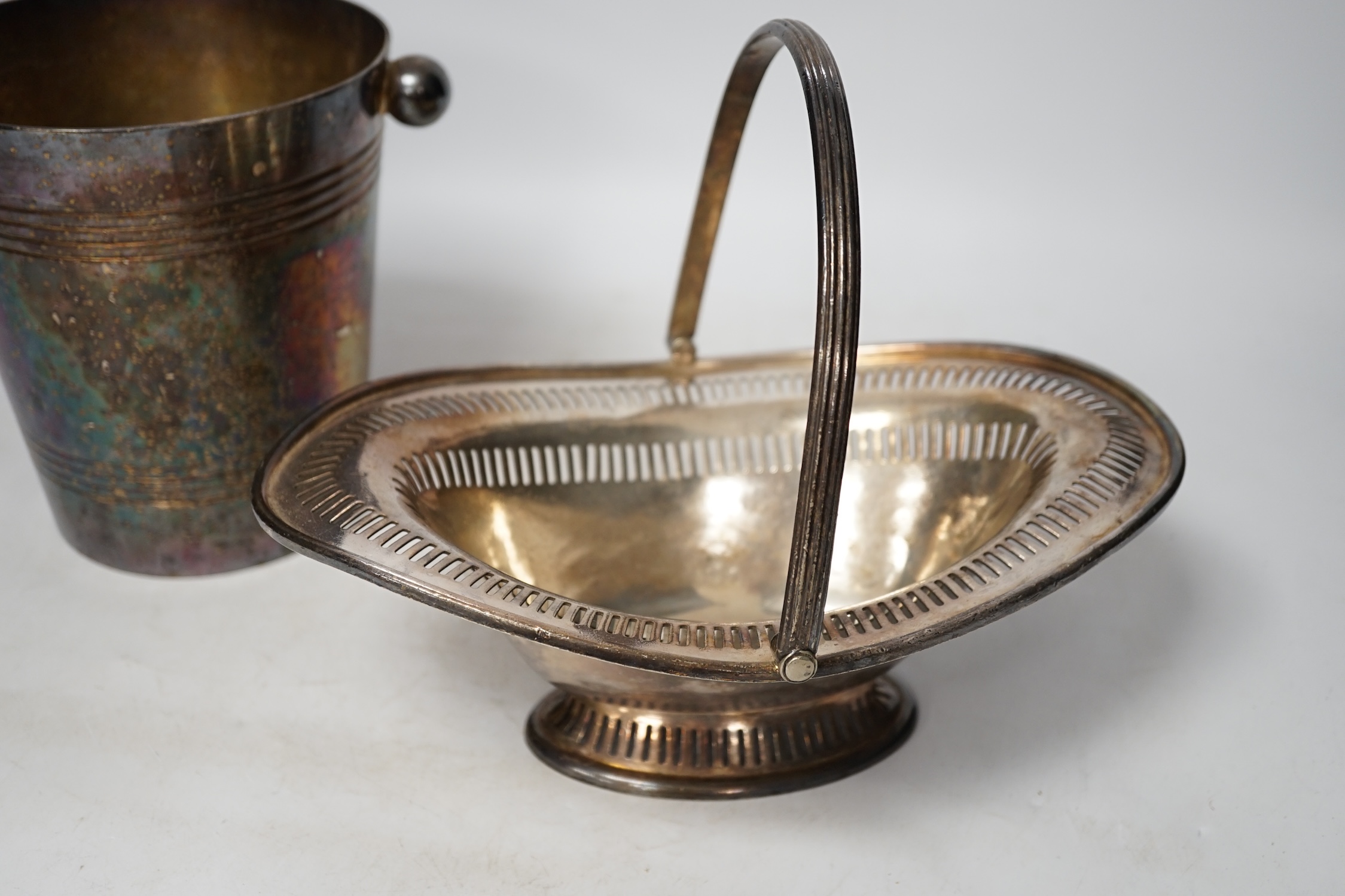 Two Savoy Hotel silver plated items comprising ice bucket and basket with swing handle together with a leather cased travelling picnic tea set. Condition - fair